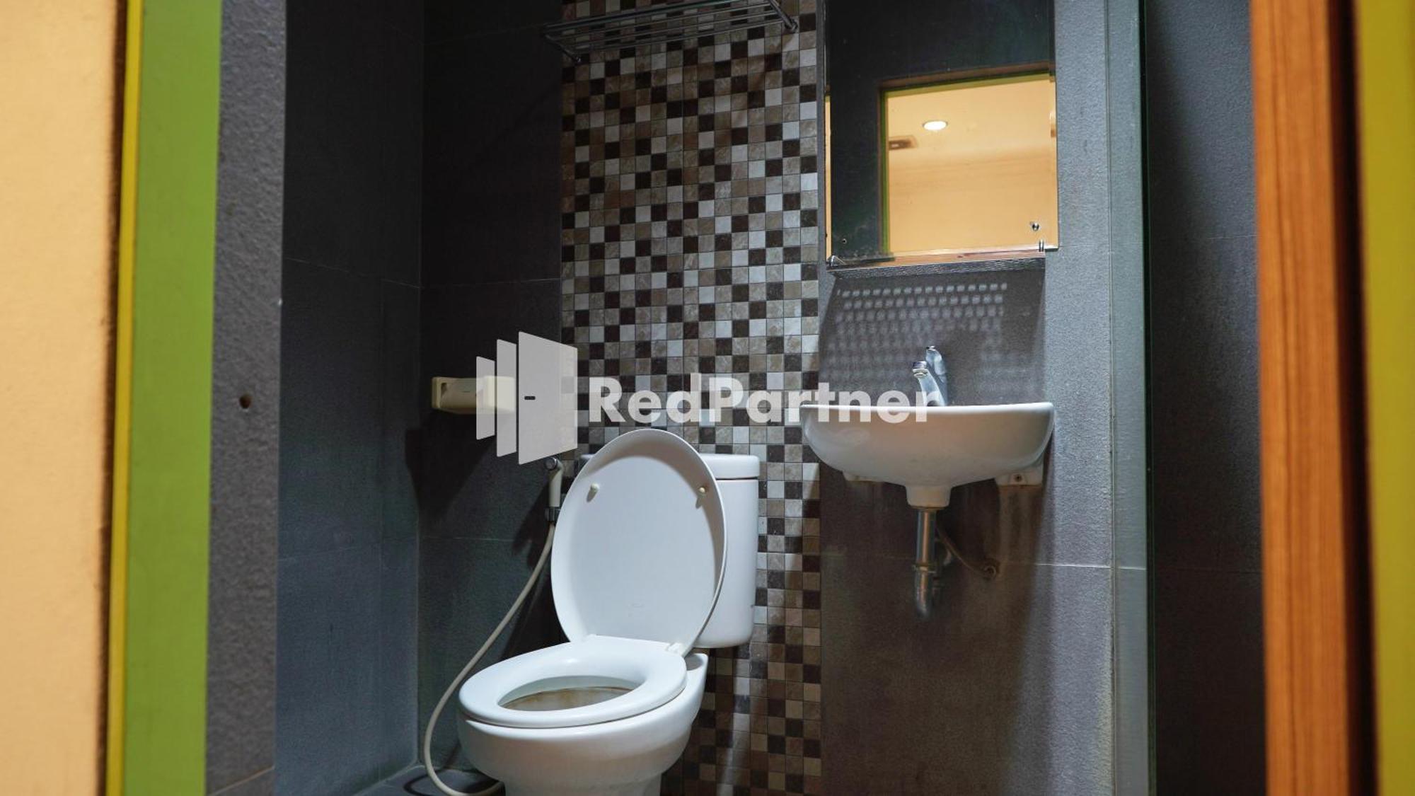 Wisma Sederhana Mitra Reddoorz Medan Bilik gambar